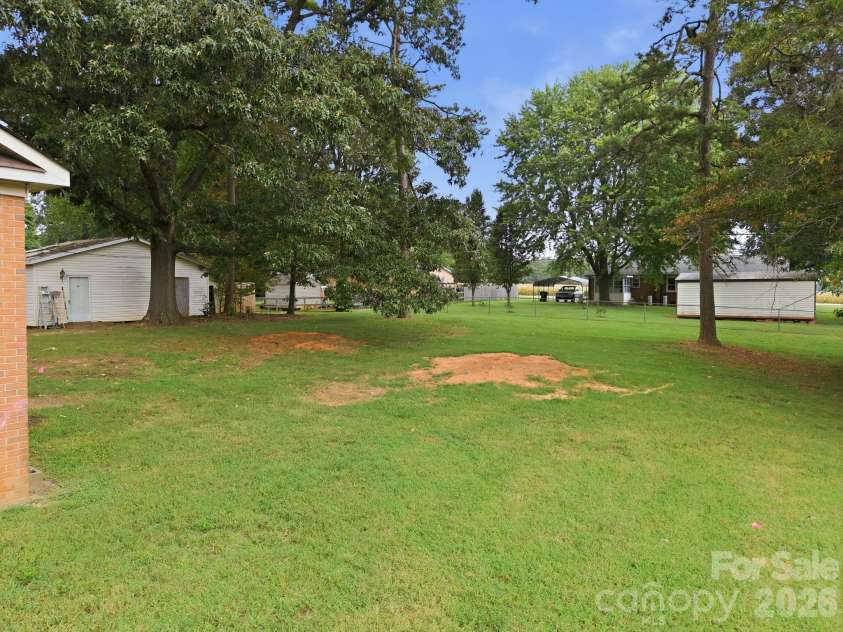 205 Pine Court, China Grove, NC 28023.  MLS# CAR4419536, YatesRealty ID 47698. Spacious back yard