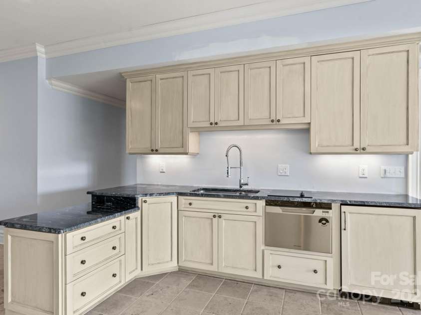 1676 Valle Cay Drive, Vilas, NC 28692.  MLS# CAR4227126, YatesRealty ID 4770. Basement kitchen 