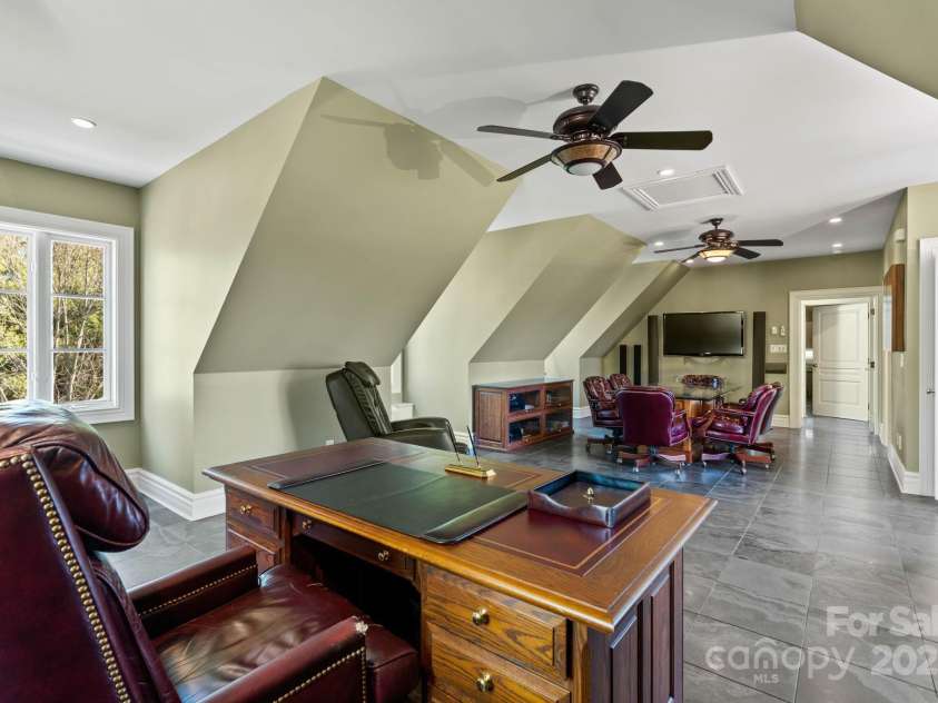 1676 Valle Cay Drive, Vilas, NC 28692.  MLS# CAR4227126, YatesRealty ID 4770. Upstair huge bonus room being used as a large office