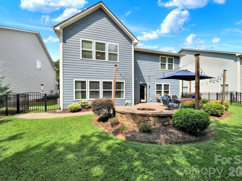 2180 Bluebell Way, Tega Cay, SC 29708.  MLS# CAR4416643, YatesRealty ID 47701. Back Exterior
