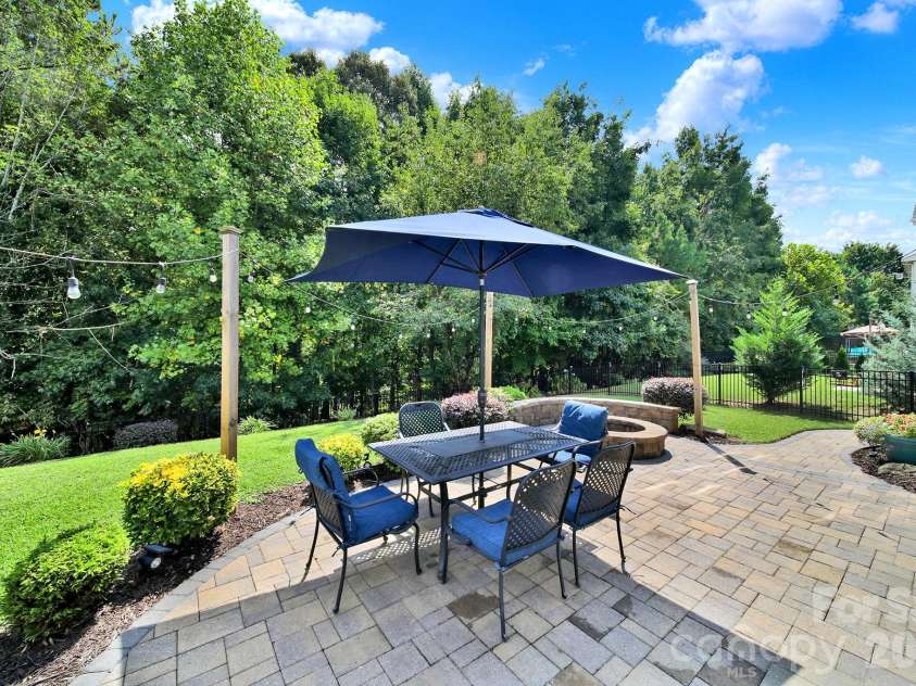 2180 Bluebell Way, Tega Cay, SC 29708.  MLS# CAR4416643, YatesRealty ID 47701. Back Patio, Fire Pit