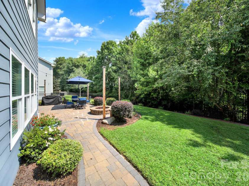 2180 Bluebell Way, Tega Cay, SC 29708.  MLS# CAR4416643, YatesRealty ID 47701. Backyard, Patio, Fire Pit