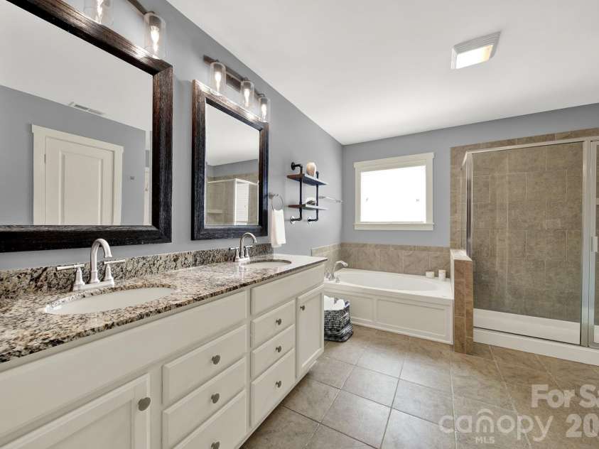 2180 Bluebell Way, Tega Cay, SC 29708.  MLS# CAR4416643, YatesRealty ID 47701. Primary Bathroom