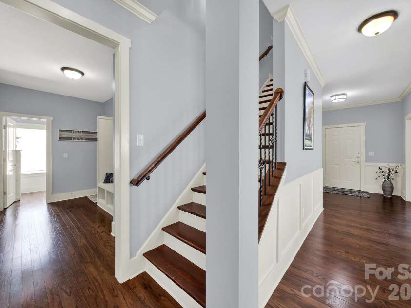 2180 Bluebell Way, Tega Cay, SC 29708.  MLS# CAR4416643, YatesRealty ID 47701. Stairs and Hall