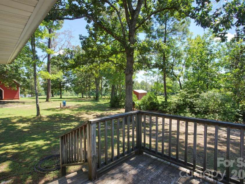 1002 Tanner Road, Rutherfordton, NC 28139.  MLS# CAR4418687, YatesRealty ID 47703. Back porch