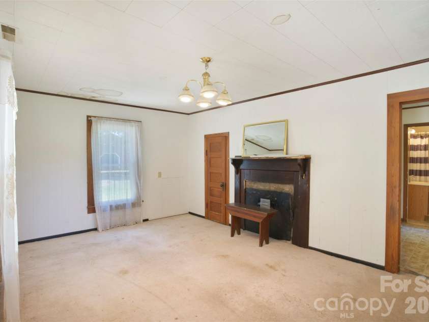 1002 Tanner Road, Rutherfordton, NC 28139.  MLS# CAR4418687, YatesRealty ID 47703. Front living room