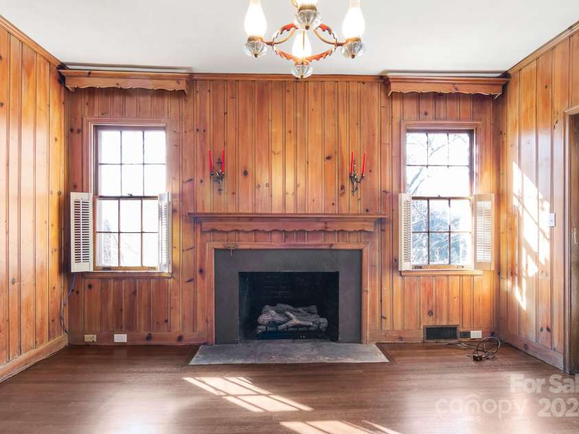615 Peach Street, Shelby, NC 28150.  MLS# CAR4119174, YatesRealty ID 4771. Cozy fireplace in the den (chandelier excluded)