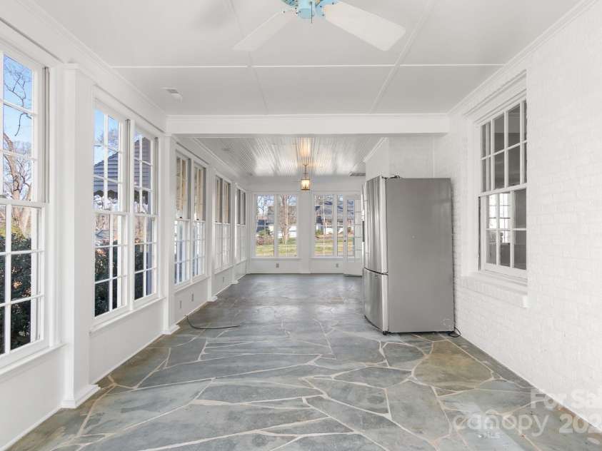 615 Peach Street, Shelby, NC 28150.  MLS# CAR4119174, YatesRealty ID 4771. Huge sunroom with slate floor (refrigerator not included)