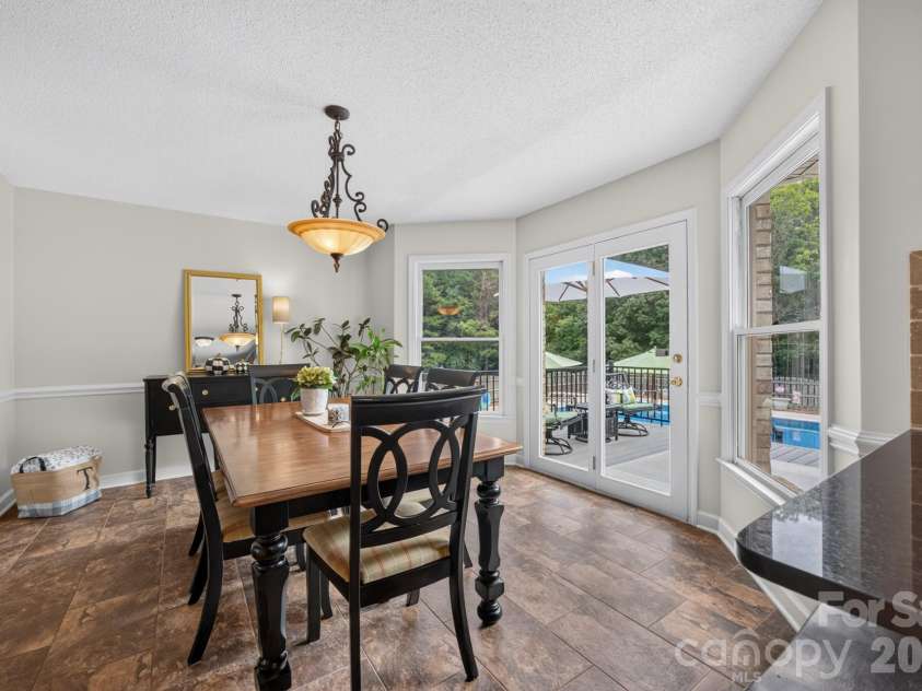 525 Gin Road, Rockwell, NC 28138.  MLS# CAR4419585, YatesRealty ID 47714. Dining / Pool