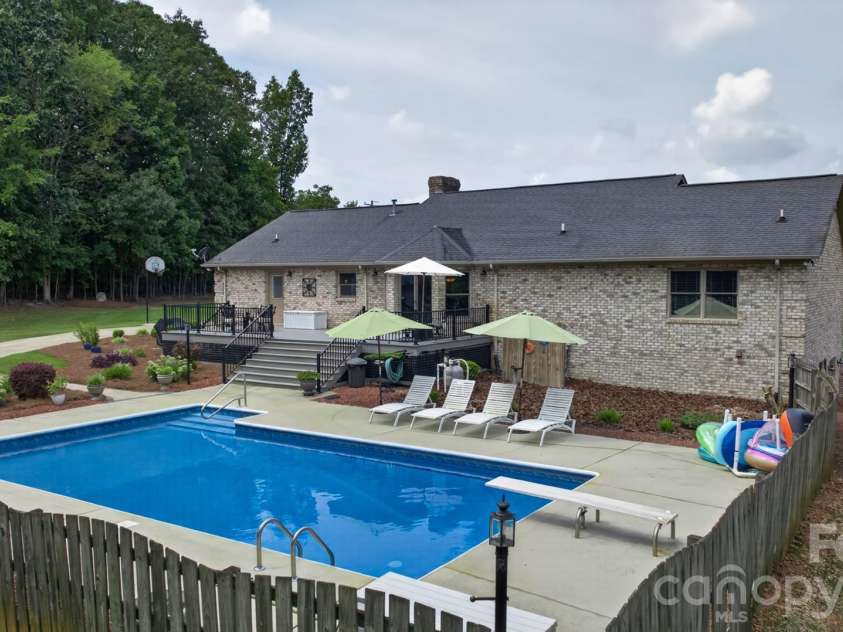 525 Gin Road, Rockwell, NC 28138.  MLS# CAR4419585, YatesRealty ID 47714. In Ground Pool