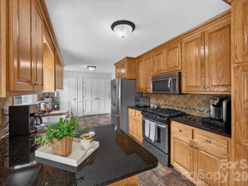 525 Gin Road, Rockwell, NC 28138.  MLS# CAR4419585, YatesRealty ID 47714. Kitchen Cabinets