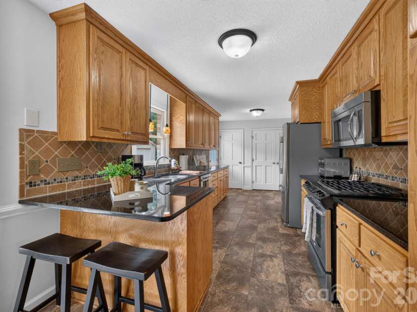 525 Gin Road, Rockwell, NC 28138.  MLS# CAR4419585, YatesRealty ID 47714. Kitchen / Eat In Bar