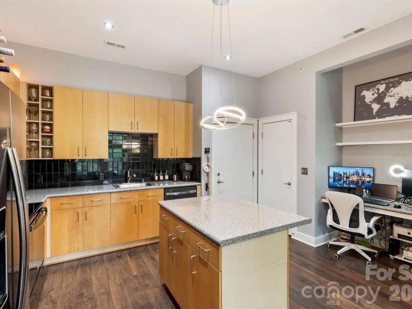 694 Davidson Street, Charlotte, NC 28202.  MLS# CAR4418966, YatesRealty ID 47716. Kitchen and Work Space