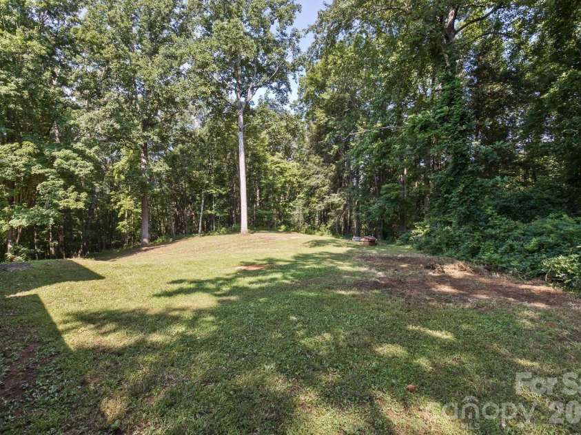 94 Stone Drive, Marion, NC 28752.  MLS# CAR4419587, YatesRealty ID 47719. Backyard