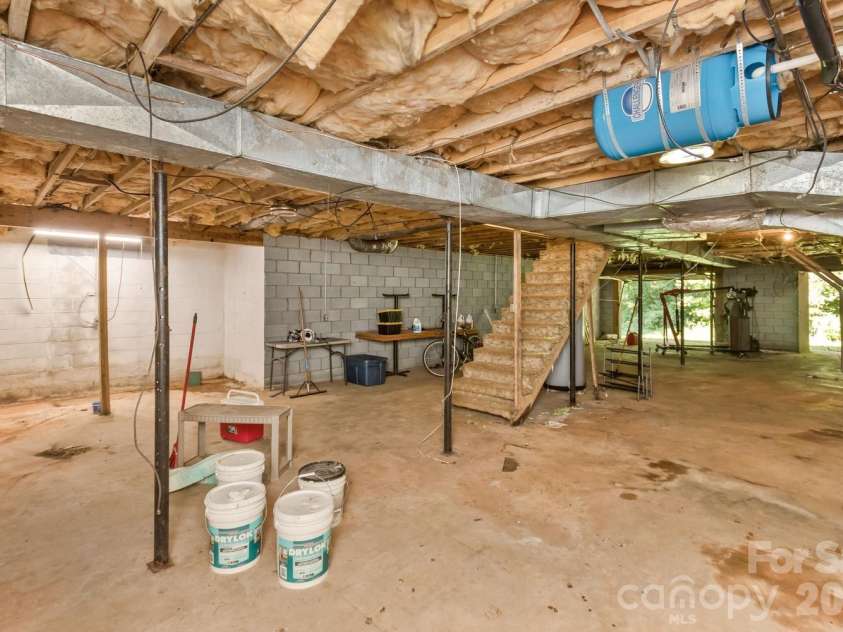 94 Stone Drive, Marion, NC 28752.  MLS# CAR4419587, YatesRealty ID 47719. Full unfinished basement