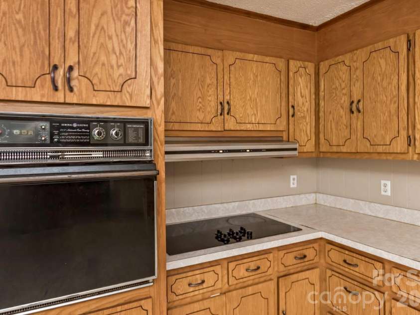 94 Stone Drive, Marion, NC 28752.  MLS# CAR4419587, YatesRealty ID 47719. Kitchen w/eat in area