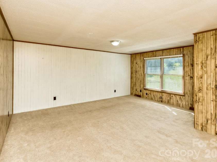 94 Stone Drive, Marion, NC 28752.  MLS# CAR4419587, YatesRealty ID 47719. Living Room