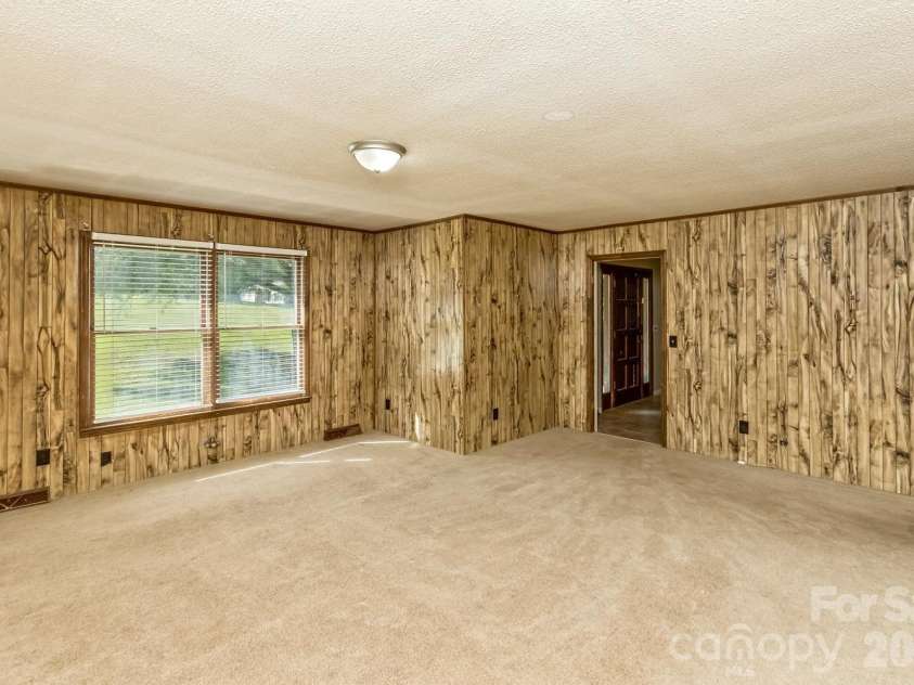 94 Stone Drive, Marion, NC 28752.  MLS# CAR4419587, YatesRealty ID 47719. Living Room