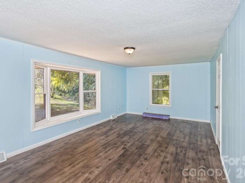 94 Stone Drive, Marion, NC 28752.  MLS# CAR4419587, YatesRealty ID 47719. Main Level Bedroom