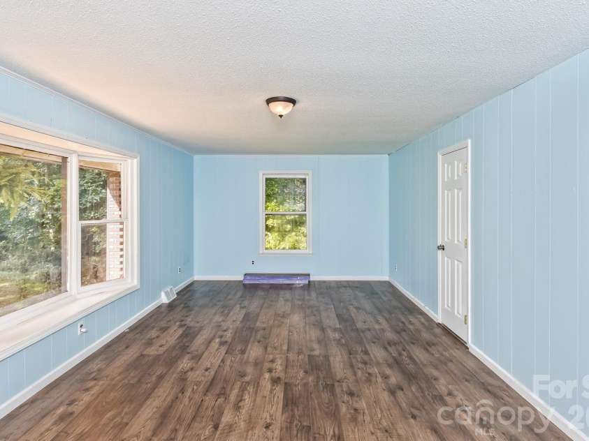 94 Stone Drive, Marion, NC 28752.  MLS# CAR4419587, YatesRealty ID 47719. Main Level Bedroom