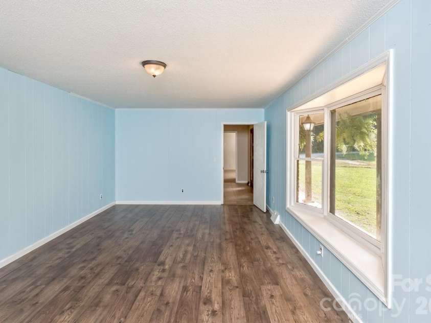 94 Stone Drive, Marion, NC 28752.  MLS# CAR4419587, YatesRealty ID 47719. Main Level Bedroom