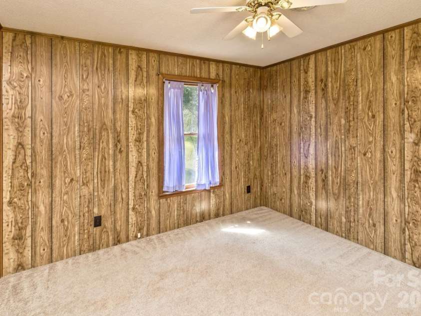 94 Stone Drive, Marion, NC 28752.  MLS# CAR4419587, YatesRealty ID 47719. Upper level bedroom