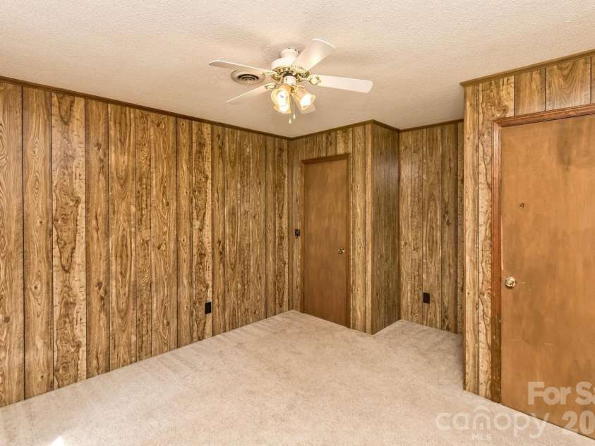 94 Stone Drive, Marion, NC 28752.  MLS# CAR4419587, YatesRealty ID 47719. Upper level bedroom