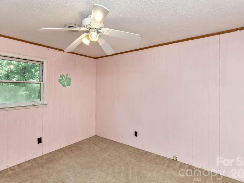 94 Stone Drive, Marion, NC 28752.  MLS# CAR4419587, YatesRealty ID 47719. Upper level bedroom