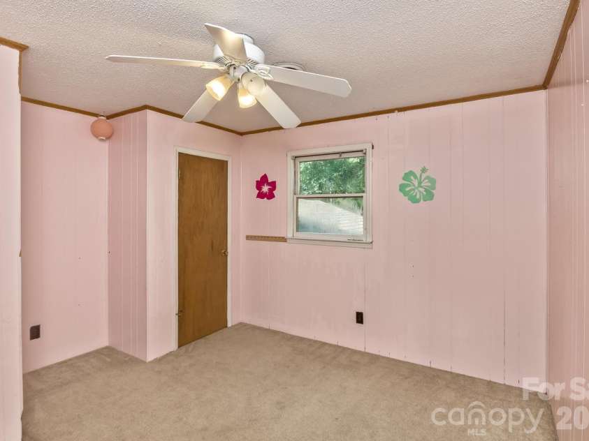 94 Stone Drive, Marion, NC 28752.  MLS# CAR4419587, YatesRealty ID 47719. Upper level bedroom