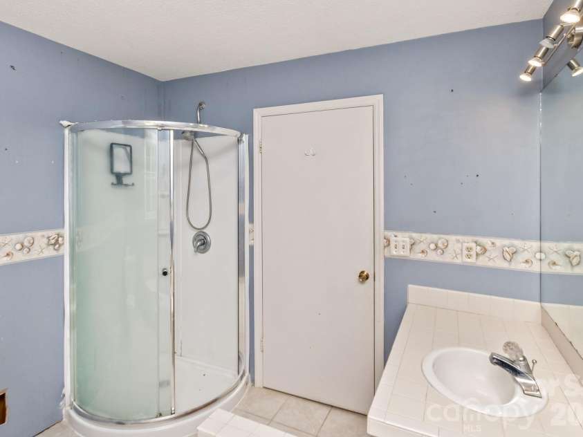 94 Stone Drive, Marion, NC 28752.  MLS# CAR4419587, YatesRealty ID 47719. Upper level bedroom