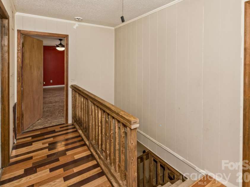 94 Stone Drive, Marion, NC 28752.  MLS# CAR4419587, YatesRealty ID 47719. Upper level hall/landing