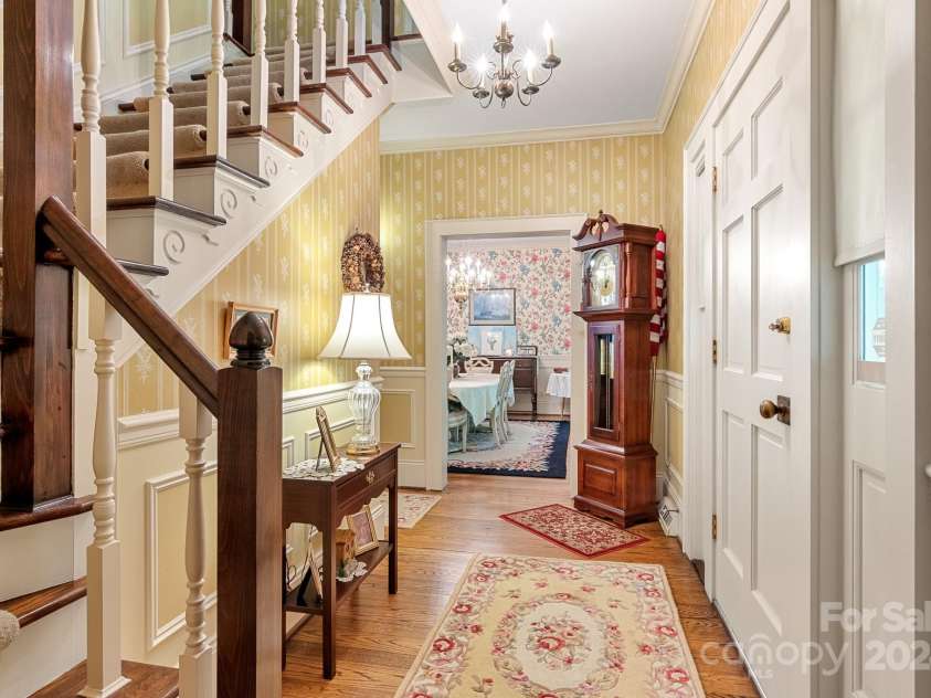 205 Vauxhall Drive, Shelby, NC 28150.  MLS# CAR4131707, YatesRealty ID 4772. The front entry houses a hall closet. Look at the wood detail on the stairs!