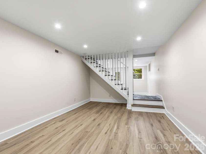 340 School Road, Asheville, NC 28806.  MLS# CAR4418622, YatesRealty ID 47721. Lower Level Finished Room