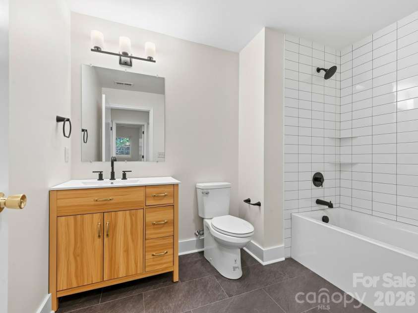 340 School Road, Asheville, NC 28806.  MLS# CAR4418622, YatesRealty ID 47721. Upstairs Hall Bath
