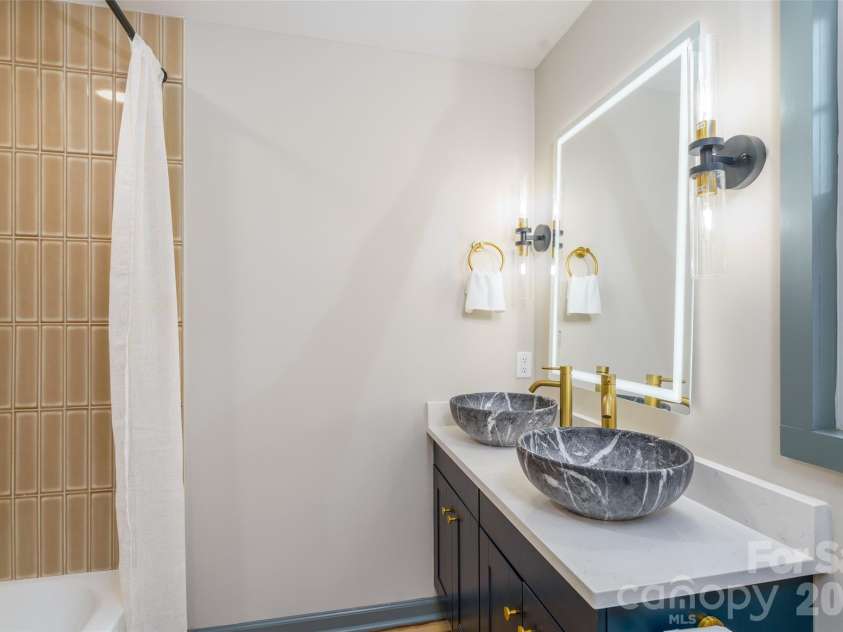 1303 Cooper Avenue, Kannapolis, NC 28081.  MLS# CAR4418614, YatesRealty ID 47724. Primary Bathroom