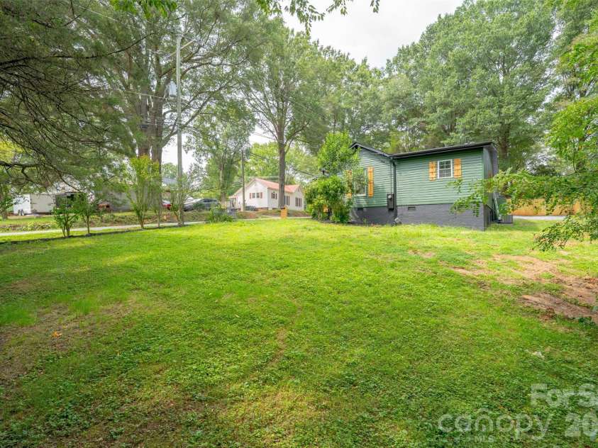 1303 Cooper Avenue, Kannapolis, NC 28081.  MLS# CAR4418614, YatesRealty ID 47724. Side view