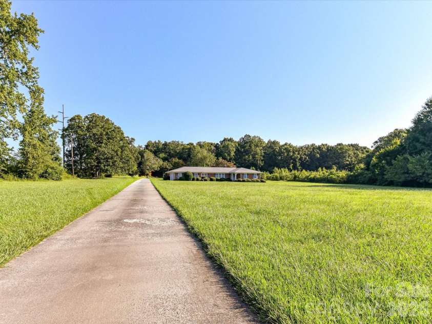 3320 Goldmine Road, Monroe, NC 28110.  MLS# CAR4418987, YatesRealty ID 47727. 