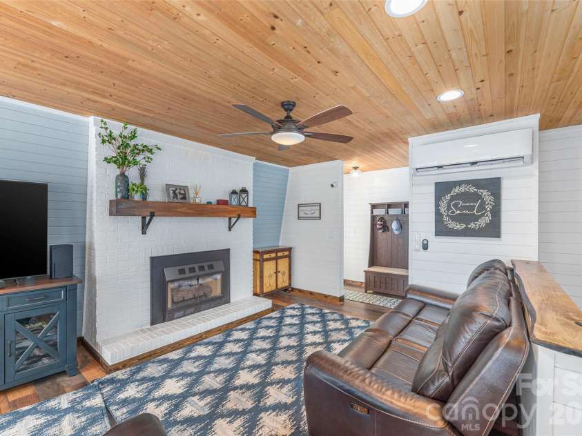 477 Locust Drive, Maggie Valley, NC 28751.  MLS# CAR4276263, YatesRealty ID 4773. Upper Living Room