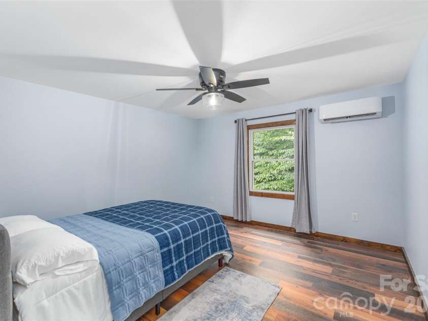477 Locust Drive, Maggie Valley, NC 28751.  MLS# CAR4276263, YatesRealty ID 4773. Upper Secondary Bedroom