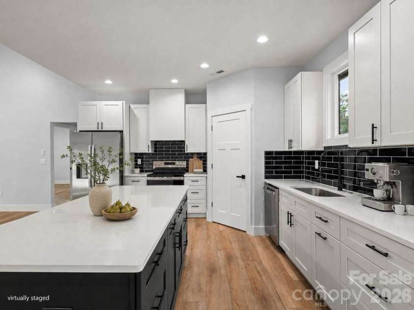 902 Narva Road, Hendersonville, NC 28792.  MLS# CAR4419215, YatesRealty ID 47734. Virtually Staged