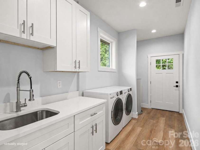 902 Narva Road, Hendersonville, NC 28792.  MLS# CAR4419215, YatesRealty ID 47734. Virtually Staged washer and dryer
