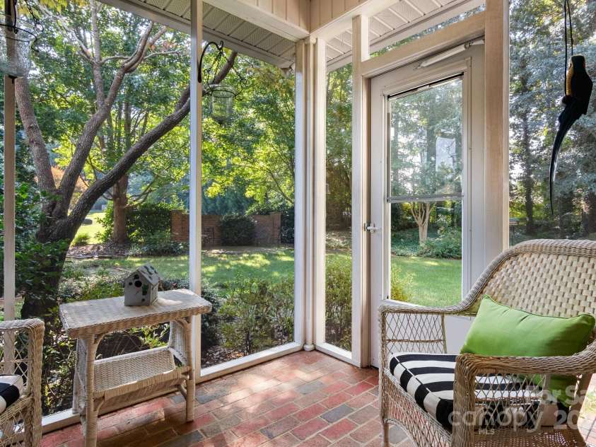 1408 Stone Gate Drive, Shelby, NC 28150.  MLS# CAR4181748, YatesRealty ID 4774. The screened porch is a peaceful place to relax and unwind!