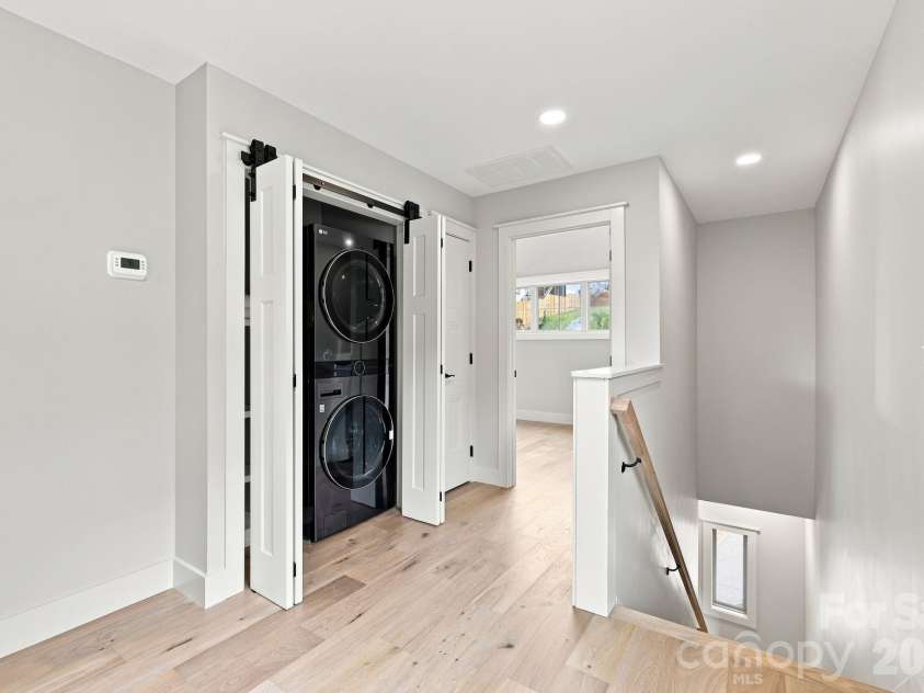 128 Chepstow Place, Black Mountain, NC 28711.  MLS# CAR4415709, YatesRealty ID 47759. Landing and laundry