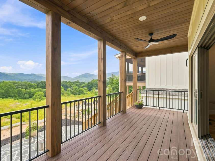128 Chepstow Place, Black Mountain, NC 28711.  MLS# CAR4415709, YatesRealty ID 47759. Main level covered deck