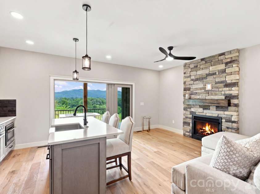 128 Chepstow Place, Black Mountain, NC 28711.  MLS# CAR4415709, YatesRealty ID 47759. Open Living Room and Kitchen