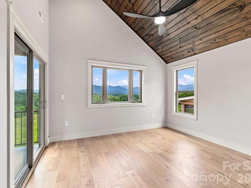 128 Chepstow Place, Black Mountain, NC 28711.  MLS# CAR4415709, YatesRealty ID 47759. Primary Bedroom with private deck
