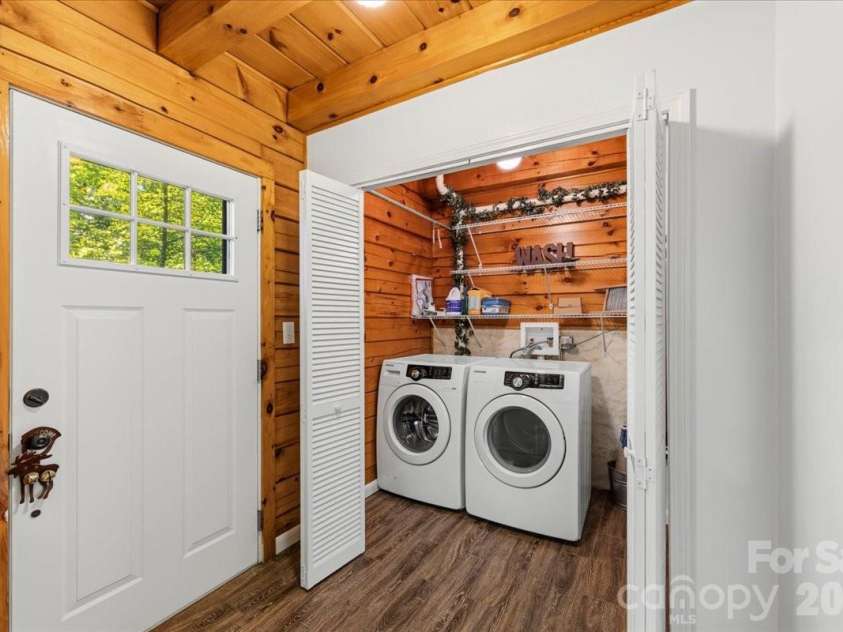 6012 Holiday Shores Avenue, Nebo, NC 28761.  MLS# CAR4419298, YatesRealty ID 47764. Main floor laundry