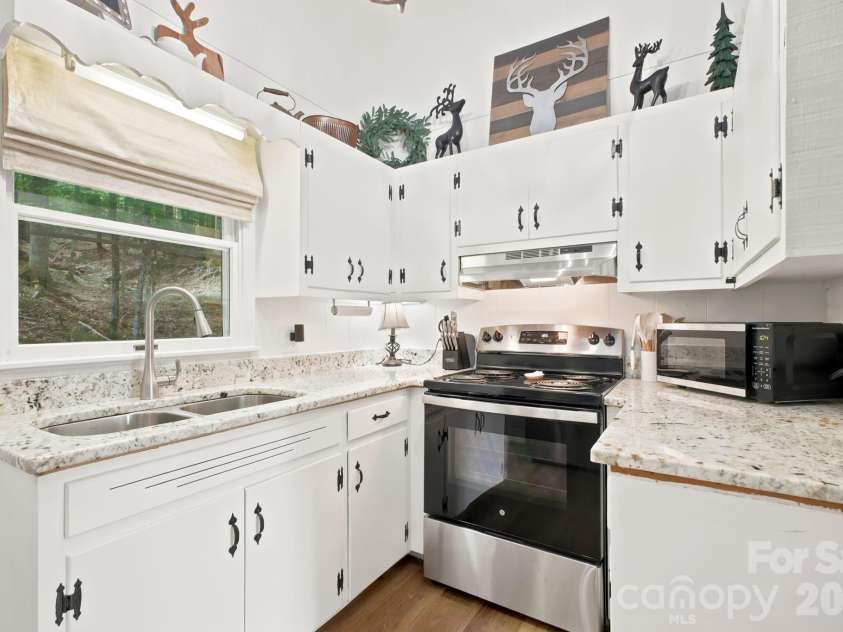 242 Charter Hills Road, Beech Mountain, NC 28604.  MLS# CAR4419611, YatesRealty ID 47769. 