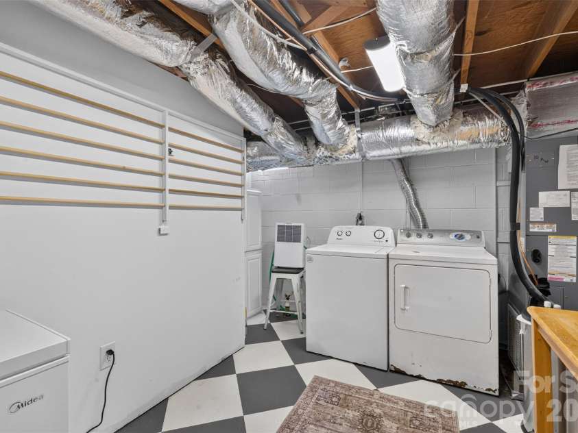 2560 NC 152 Highway, China Grove, NC 28023.  MLS# CAR4419454, YatesRealty ID 47771. Laundry Room with Drying Rack