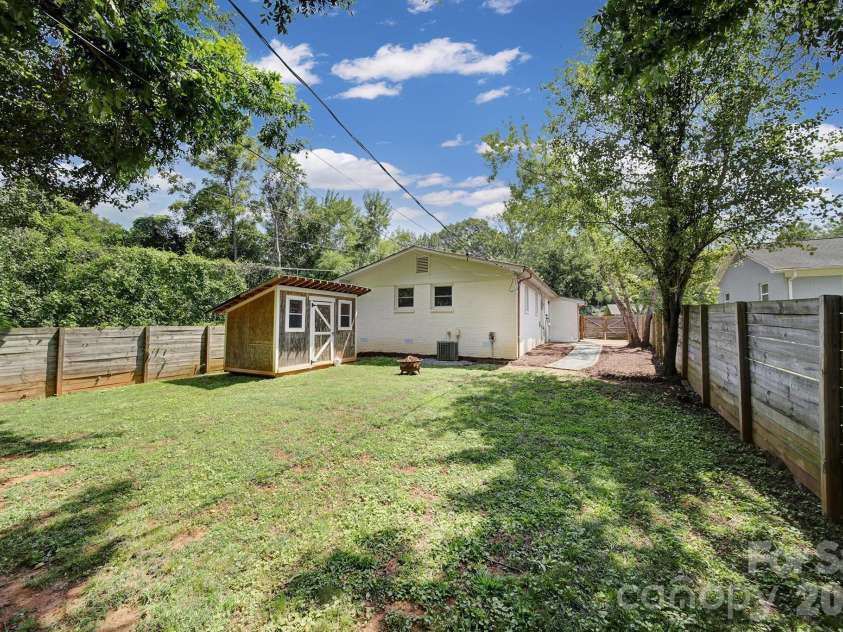 3335 Dunaire Drive, Charlotte, NC 28205.  MLS# CAR4419256, YatesRealty ID 47772. Backyard and shed